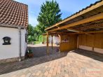 Gemütliche Doppelhaushälfte mit Seenähe in Stöbnitz . - Terrasse mit Schuppen und Carport