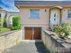 Hier beginnt Zuhause – gepflegter Bungalow mit Garten und vielseitigen Möglichkeiten in Merseburg - Einfahrt zur Tiefgarage