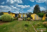 Toller Bungalow mit Garage und sonnigem Garten in beliebter Wohnlage von Bitterfeld/Wolfen. - Garten und Hinteransicht
