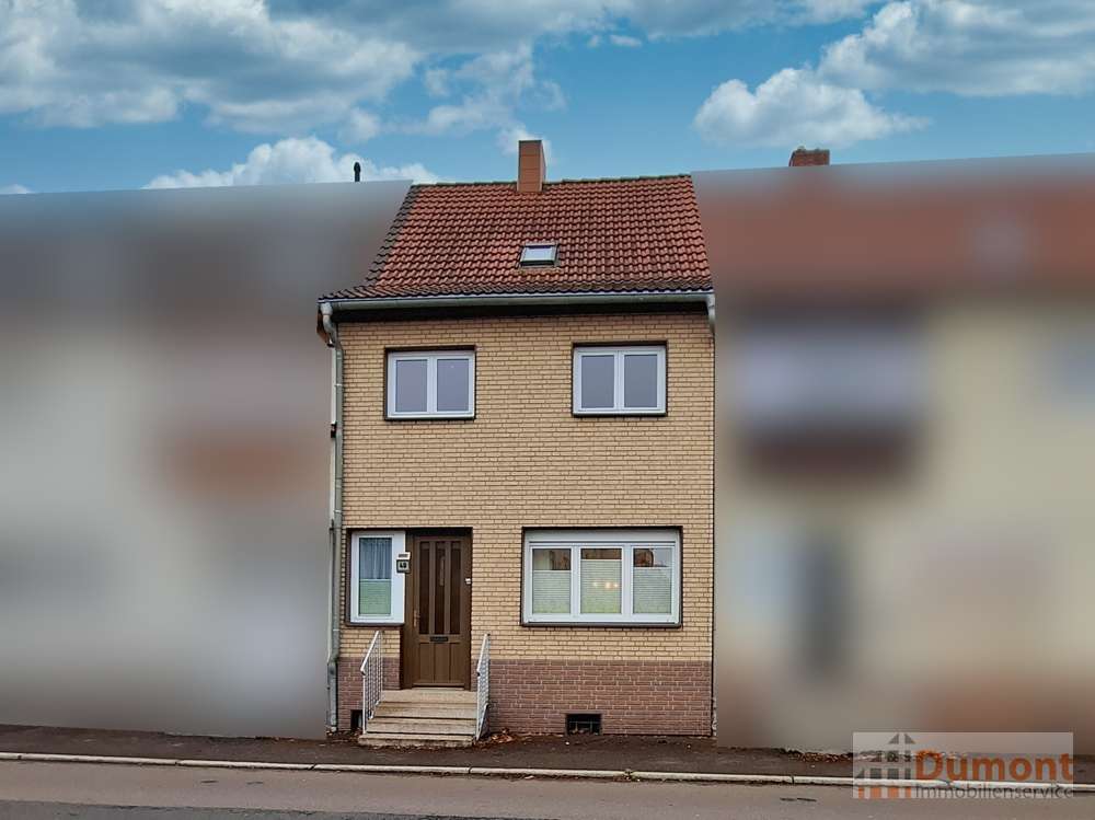 Reihenhaus mit Ausbaupotenzial und pflegeleichtem Grundstück in beliebter Lage von Merseburg.